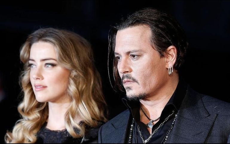 Amber Heard y Johnny Depp en un evento en 2015. GETTY IMAGES