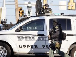 Policías encontraron en el lugar dos armas semiautomáticas y un cargador de alta capacidad. No hay detenidos. EFE / T. Mihalek