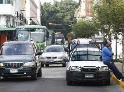 Las arañas inmovilizadoras se colocarían en autos mal estacionados en algunas zonas de Guadalajara. EL INFORMADOR/ARCHIVO