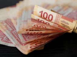 La divisa nacional en los mercados internacionales cotiza alrededor de los 20.61 pesos por dólar al mayoreo. EL INFORMADOR/ARCHIVO