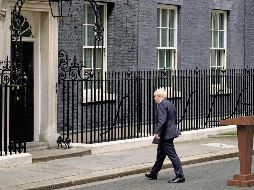 La presión dentro de su Gobierno y partido hicieron que Johnson renunciara al cargo. AFP