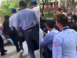Cuando policías pretendían remitir al Ministerio Público a la empleada y al gerente del lugar, los demás trabajadores intervinieron, lo que desató la pelea. ESPECIAL/CAPTURA DE VIDEO