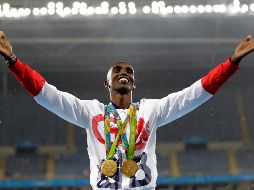 El atleta contó que era un niño cuando una mujer que no conocía lo llevó al Reino Unido con un pasaporte falso que tenía su foto con el nombre Mohammed Farah. AP / ARCHIVO