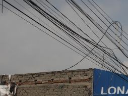 En mayo pasado, un accidente vial que involucró cableado suelto provocó la muerte de un hombre en el cruce de las calles General Coronado y Hospital. EL INFORMADOR/ARCHIVO