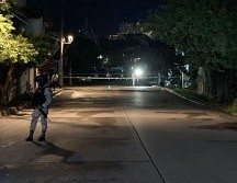 Peritos del Instituto Jalisciense de Ciencias Forenses trasladaron el cuerpo hasta sus instalaciones donde se llevará a cabo la práctica de la necropsia. EL INFORMADOR/ARCHIVO