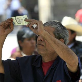 ¿Cuántos años puedes pasar en la cárcel si pagas con un billete falso?