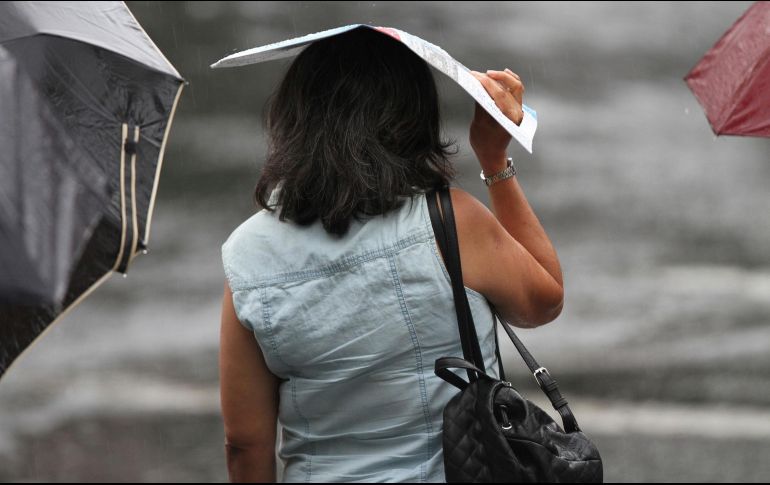 Las lluvias serán con descargas eléctricas, vientos fuertes y posibles granizadas, por lo que podrían ocasionar deslaves. NTX / ARCHIVO