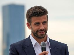 Piqué se mostró ante el público en compañía de su nueva pareja, a pesar de un supuesto acuerdo con Shakira. AFP/ARCHIVO