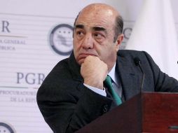 López Obrador puntualiza que aunque Murillo Karam se autoinculpó cuando afirmó que era responsable directo de la investigación del caso, tiene derecho a defenderse. SUN / ARCHIVO