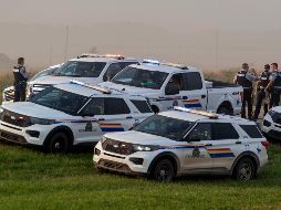 Videos y fotografías desde el lugar del incidente mostraban una camioneta blanca fuera del camino y rodeada de vehículos policiales. AP/H. Yu