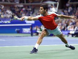 Carlos Alcaraz se enfrentará este viernes al estadounidense Frances Tiafoe por su primera final de Grand Slam y seguir en la carrera por el número uno del mundo. AFP / J. Finney