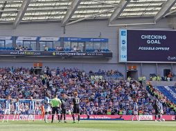 Los estadios británicos estarán vacíos y no se cantarán goles en el Reino Unido. AFP/A. Dennis