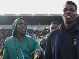 Mathias Pogba (I) se presentó voluntariamente ante las autoridades competentes y fue puesto bajo arresto policial, que puede durar hasta 24 horas. AFP / ARCHIVO