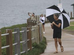 Las inundaciones provocaron la crecida de arroyos y causaron estragos, como el arrastre de una veintena de vehículos. AFP/ARCHIVO