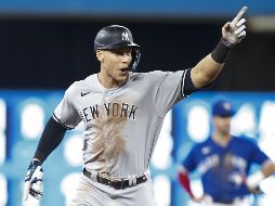 Judge recorrió las bases sonriendo, cobijado por los aplausos de los presentes y con sus padres, que lo adoptaron de pequeño, en las gradas. AFP/C. Burston