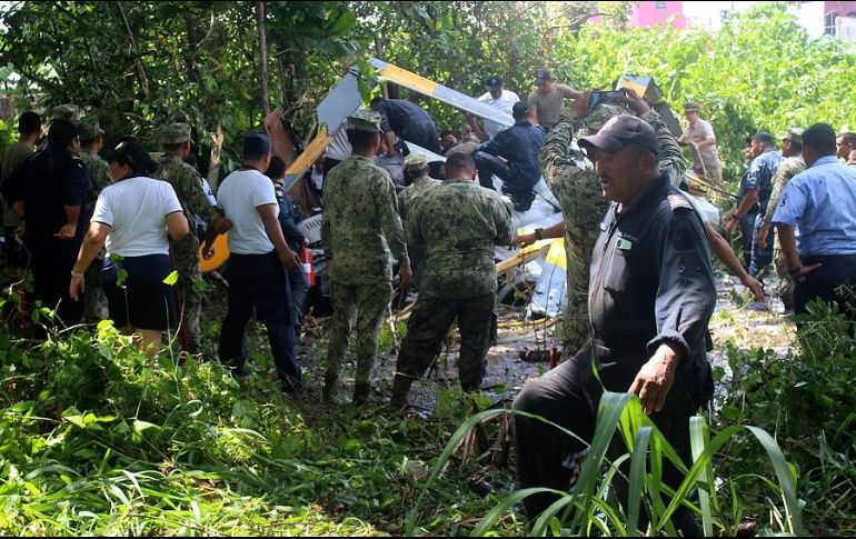 En el helicóptero se transportaban cinco elementos navales, de los cuales tres murieron. EFE/N. Ortiz