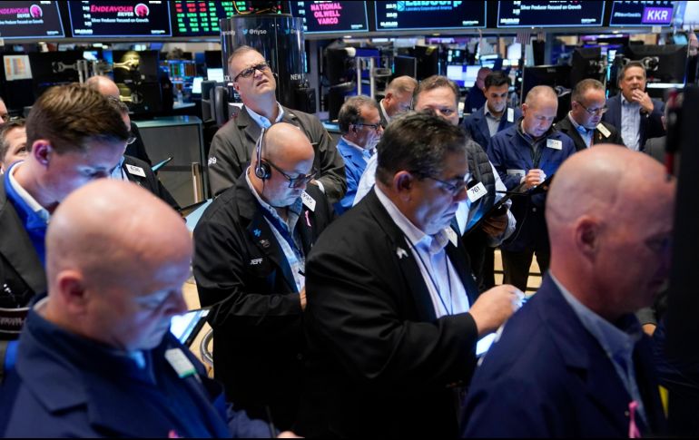 La mayoría de los sectores cerraron en rojo, encabezados por el de servicios públicos, el inmobiliario y el de materias primas. AP/S. Wenig