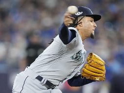 Luis Castillo se convirtió en el primer pitcher de Seattle en playoffs en tirar más de siete episodios. AFP/M. Blinch