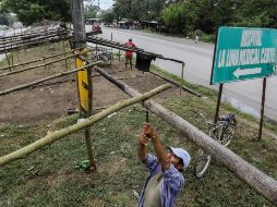 En Honduras, pobladores refuerzan sus viviendas ante el riesgo que 