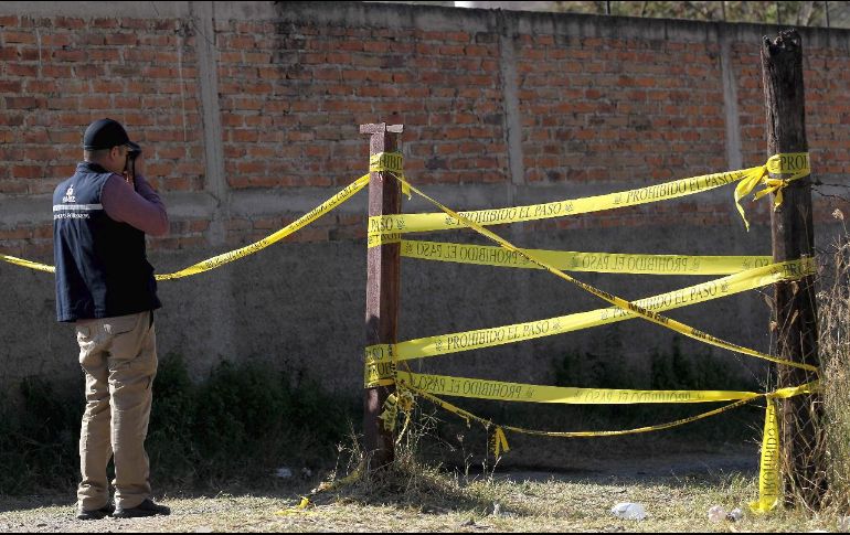 Personal del Instituto Jalisciense de Ciencias Forenses se encargará del traslado de los cuerpos. EL INFORMADOR / ARCHIVO