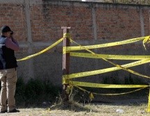 Personal del Instituto Jalisciense de Ciencias Forenses se encargará del traslado de los cuerpos. EL INFORMADOR / ARCHIVO