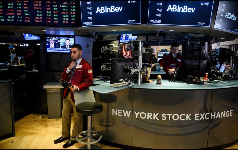 Entre las 30 empresas cotizadas del índice Dow Jones, las mayores ganancias fueron para JPMorgan y Coca-Cola. AFP/ARCHIVO