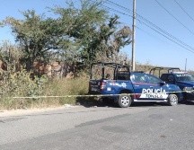 Los oficiales locales notificaron a un agente del Ministerio Público, quien abrió una carpeta de investigación por el crimen. ESPECIAL /