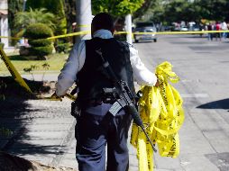 La Agencia Estatal de Investigación y la Dirección de Ciencias Forenses realizan la investigación. EL INFORMADOR/Archivo