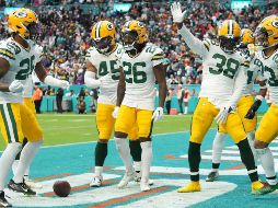 Los Green Bay Packers mantuvieron sus posibilidades de clasificarse para los playoffs de la NFL. AFP/Eric Espada