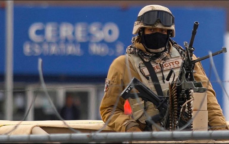 Por toda la zona se registró un fuerte dispositivo de seguridad por elementos de los tres niveles de gobierno. AFP/H. Martínez
