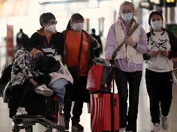 El incremento de contagios en China enciende las alarmas. AFP/ARCHIVO