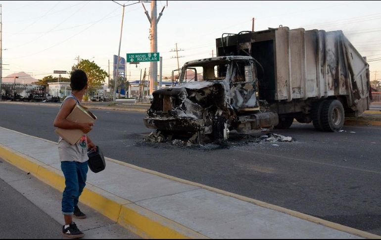 Confirman 250 robos de vehículos, de los cuales 51 fueron incendiados. AFP/J. Cruz