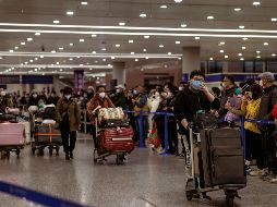 Más de 250 mil pasajeros ingresaron a China. EFE/A. Plavevski