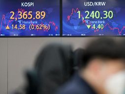 Entre los 30 valores del Dow Jones, destacaron las ganancias de Microsoft, Home Depot y Apple. AP/L. Jin-man