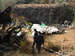 Hasta el momento se han recuperado los cuerpos de 71 de las 72 personas a bordo. AFP/P. Mathema