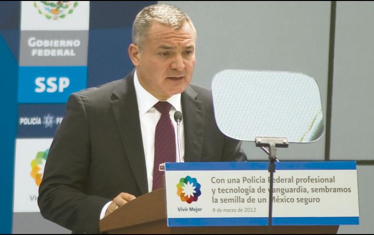 Un testigo observó lo que aparentaba una reunión de García Luna con unos criminales. AFP