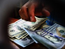 Este jueves, el tipo de cambio es de 18.34 pesos por cada dólar. EL INFORMADOR/ARCHIVO