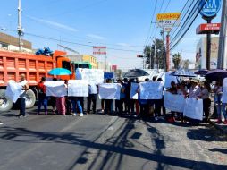 En Avenida Concepción, en Tlajomulco, alrededor de 30 personas se reunieron en exigencia de una explicación. ESPECIAL