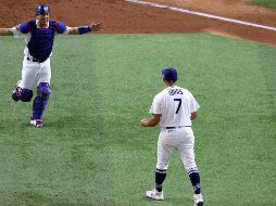 AUSTIN BARNES Y JULIO URÍAS. Son sólo dos jugadores de la que es quizá la nómina más talentosa con la que México ha encarado este torneo. AFP / ARCHIVO