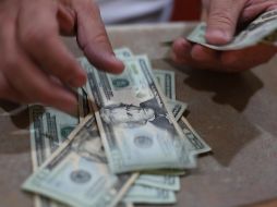 De acuerdo con el Banco de México, el tipo de cambio para hoy es de 18.38 por cada dólar. EL INFORMADOR/ARCHIVO