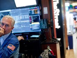 Wall Street todavía está evaluando cómo afectará la reciente reorganización bancaria a la economía en general, pero los inversores ya celebran que se hayan tranquilizado las aguas. AP / S. Wenig