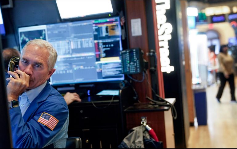 Wall Street todavía está evaluando cómo afectará la reciente reorganización bancaria a la economía en general, pero los inversores ya celebran que se hayan tranquilizado las aguas. AP / S. Wenig