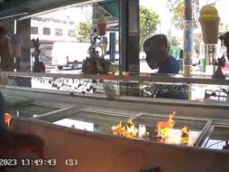 Todo fue grabado por una cámara de vigilancia. SUN