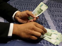 En la parte de la deuda pública de México, según el reporte cerrará con una disminución en la presente administración. NOTIMEX/Archivo