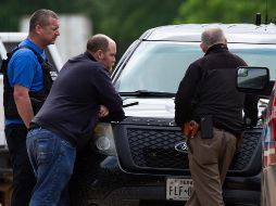 Los agentes encontraron tres hombres con heridas de bala y les prestaron primeros auxilios. AP/Y. Lee