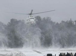 El jefe del grupo de mercenarios rusos Wagner informó que sus fuerzas derribaron un helicóptero del Ejército ruso. EFE/ S. Dolzhenko