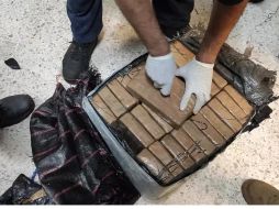 La agente del MP transportaba varias decenas de kilos de la droga. SUN