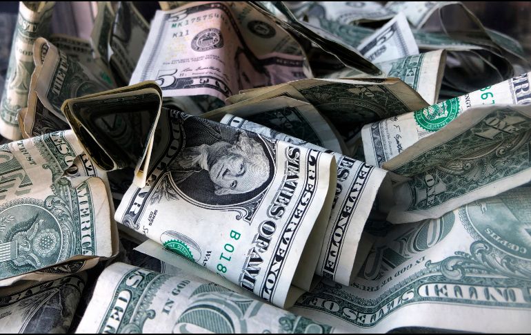 El dólar está por ubicarse en los 16 pesos mexicanos. AP/ ARCHIVO