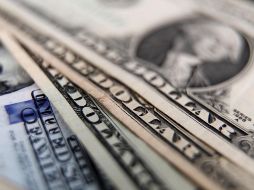 La divisa mexicana en los mercados internacionales se ubica en los 16.74 pesos por dólar al mayoreo. EFE/ ARCHIVO