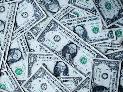 El peso mexicano se ubica en los mercados internacionales a los 16.76 pesos por dólar al mayoreo. UNSPLASH